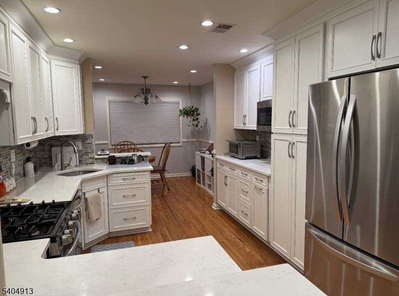 THIS LOVELY TOWNHOUSE offers a perfect blend of space and comfort.