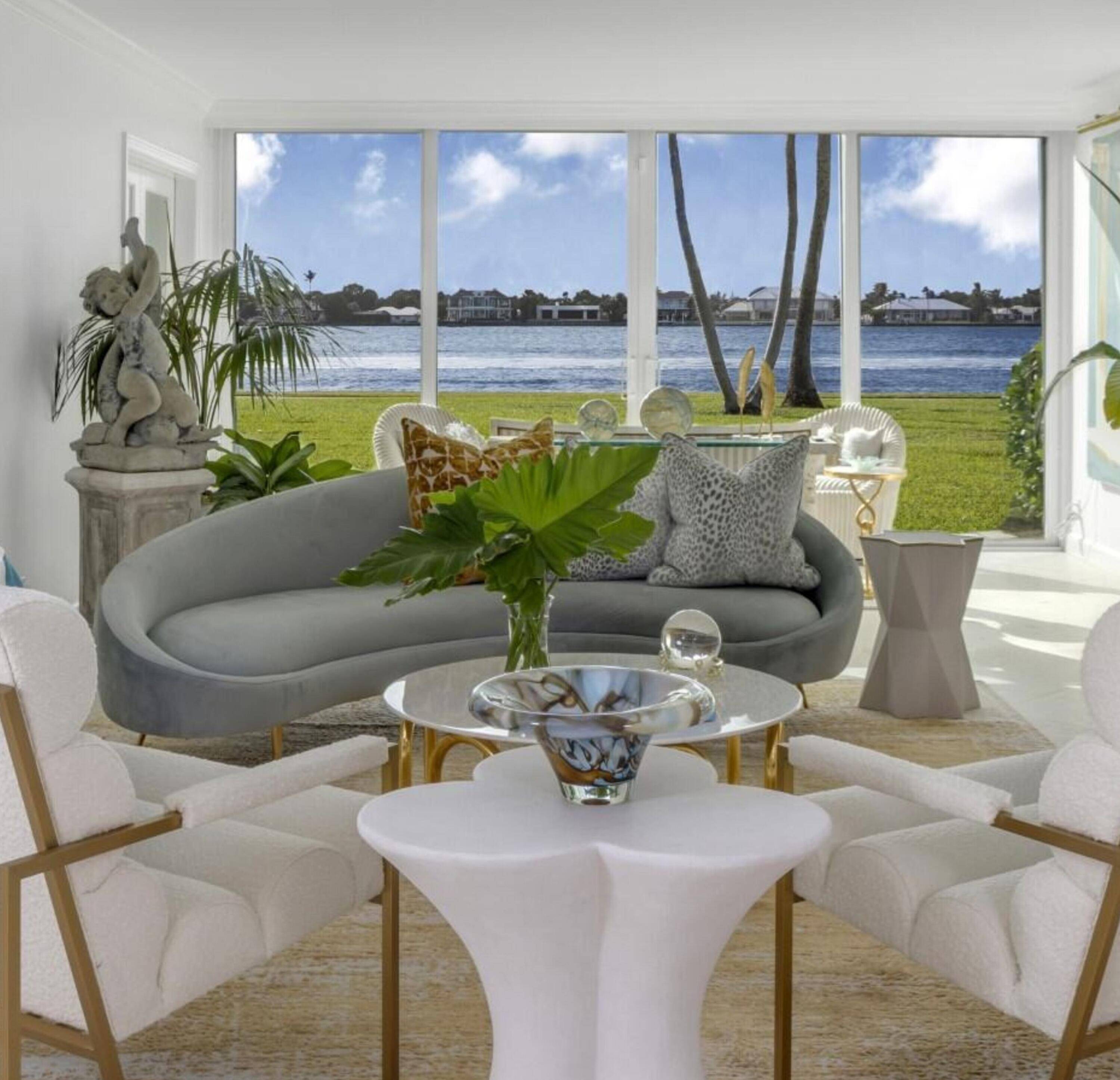 Direct Lakefront views from this 2BR 2BA first floor corner unit with an open living concept design.