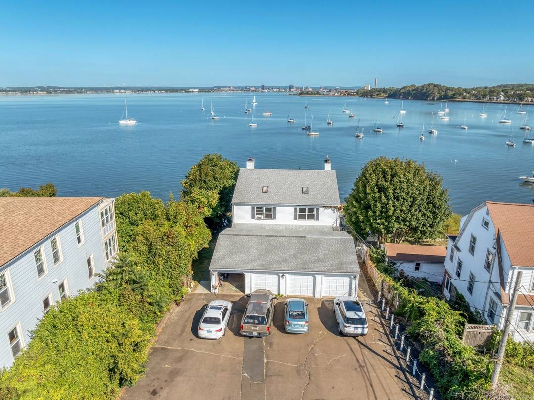 Welcome to 86 88 Cove Street, a rare direct waterfront four unit building in New Haven's Cove neighborhood.