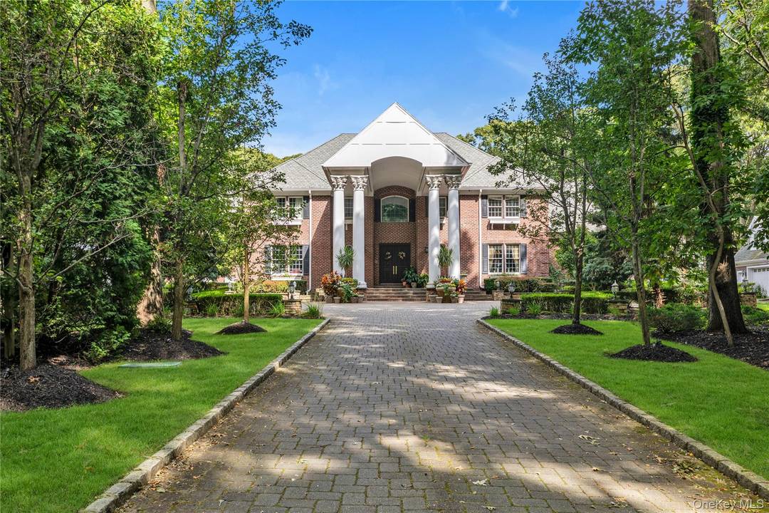 In the exclusive private enclave Lands End in the Village of Lattingtown, this exceptional newer estate is set on four beautifully landscaped acres and built to the highest standards of ...