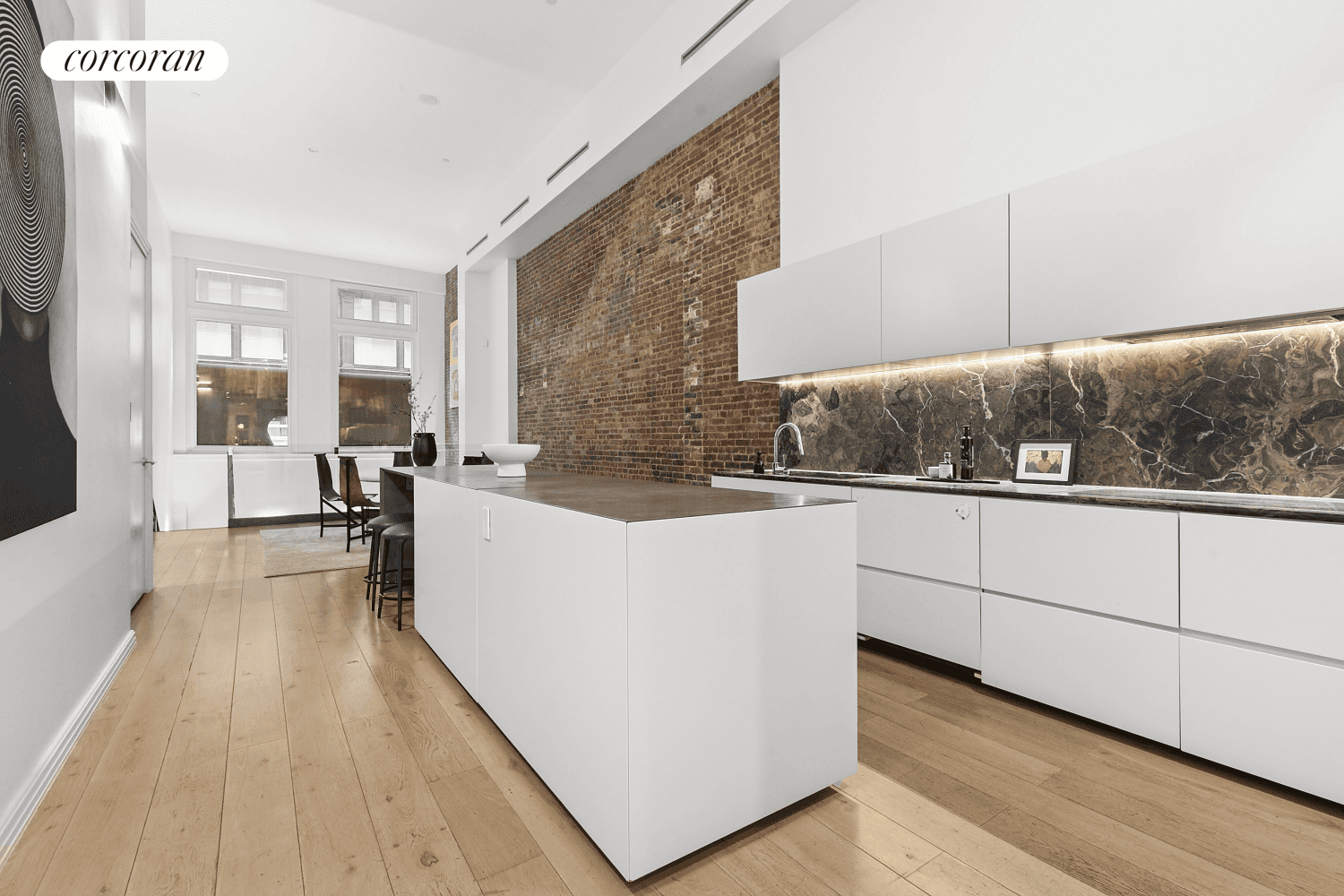 Nestled in the heart of Tribeca, this remarkable triplex conversion residence offers an exceptional blend of modern convenience and classic New York City style.