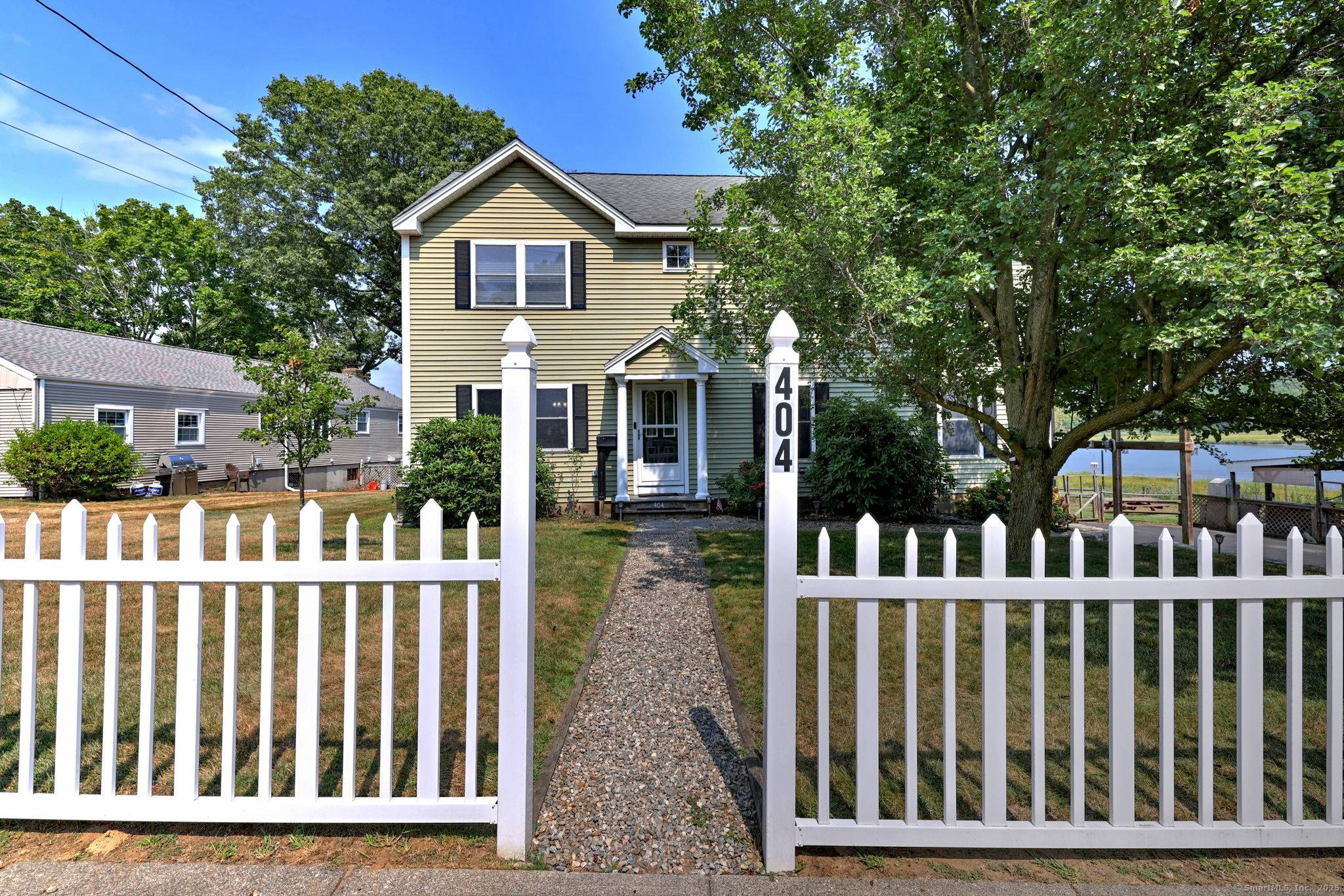Welcome to Waterfront Living a stunning 5 bedroom Colonial.