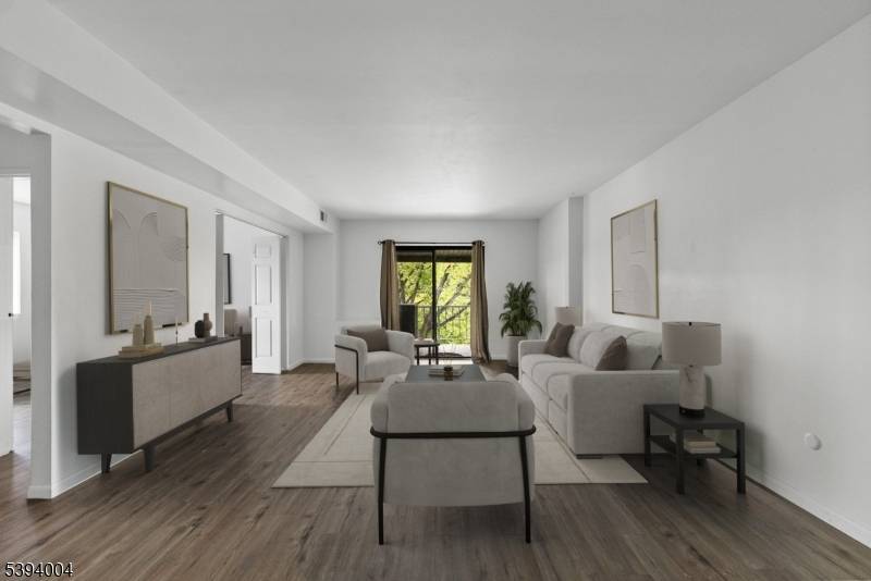 Welcome home to stylish, low maintenance living in this bright and inviting two bedroom, one and a half bath condo perfectly located near everything you love.