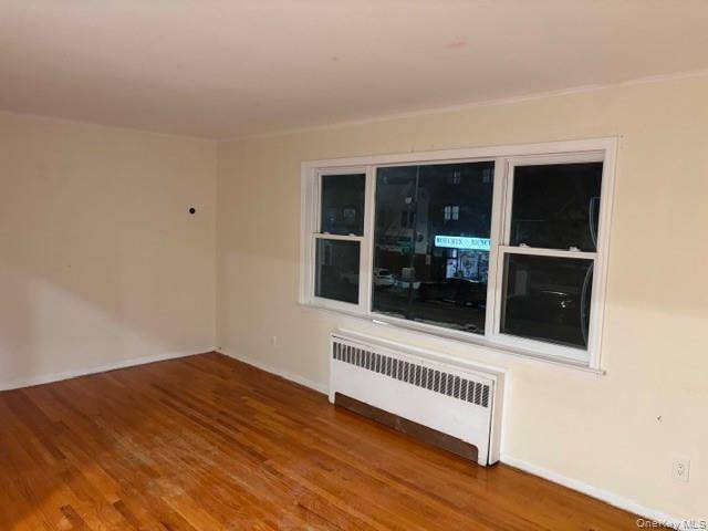 Spacious 3 Bedroom, 1 Full Bathrooms on the 2nd FL in a Multi family house, Features Open Kitchen, Dining Room, Living Room.