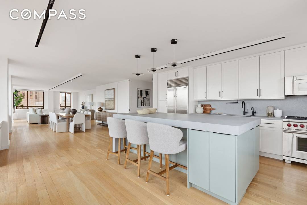 Welcome to Residence 25B C, a rare and meticulously renovated high floor combination that embodies refined Upper East Side living.