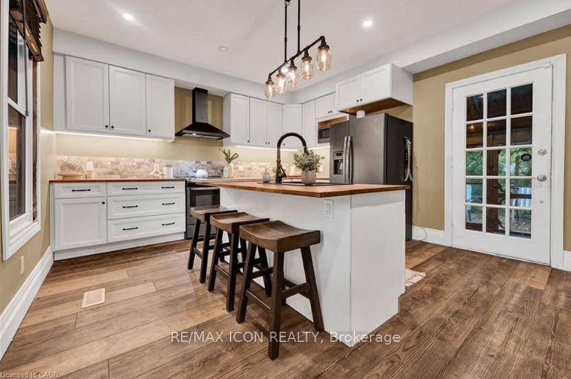 This beautifully cared for century home is move in ready and perfectly situated in one of Cambridges most desirable, family friendly neighbourhoods.