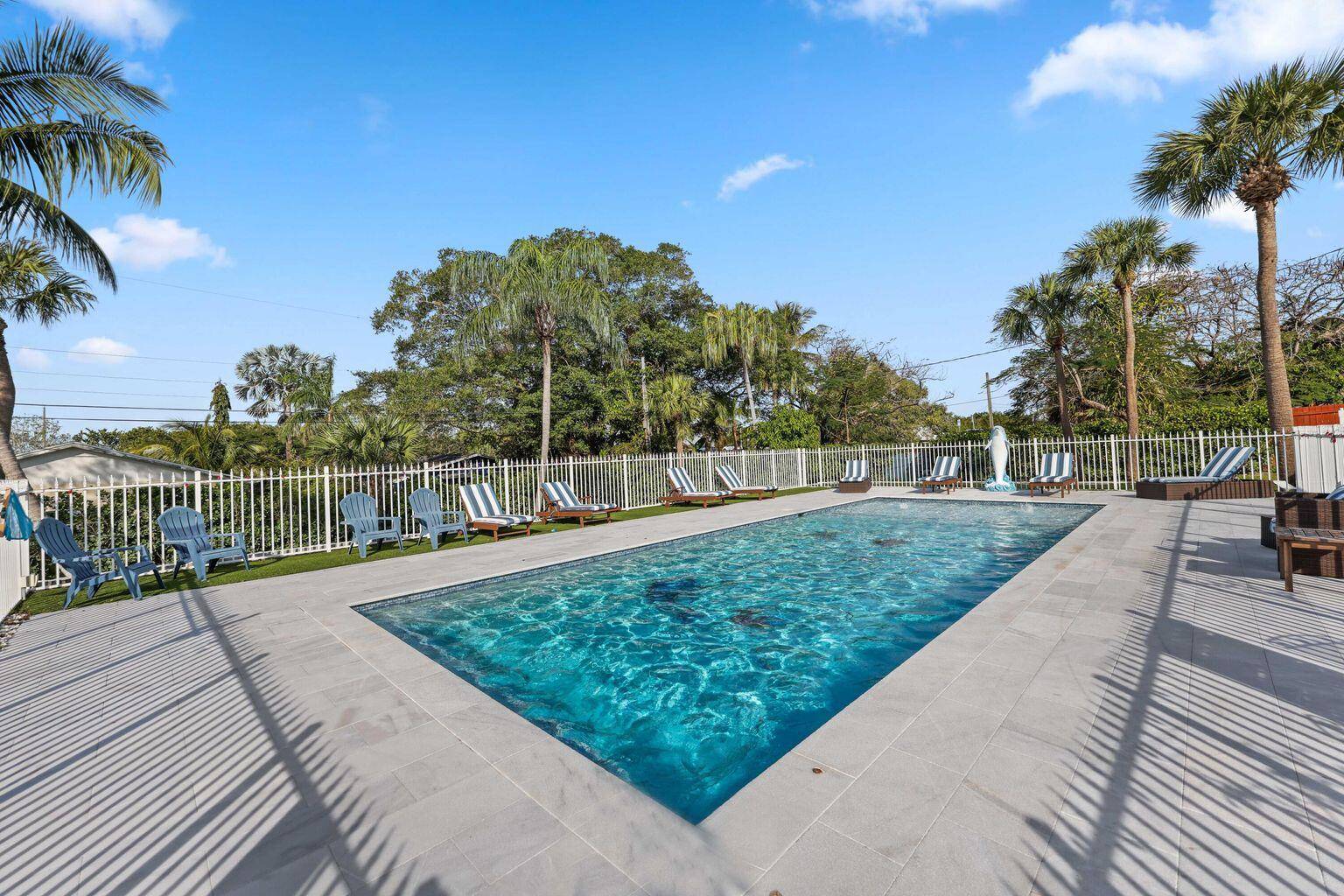 CHARMING HOME ON A DOUBLE LOT, with resort style pool.