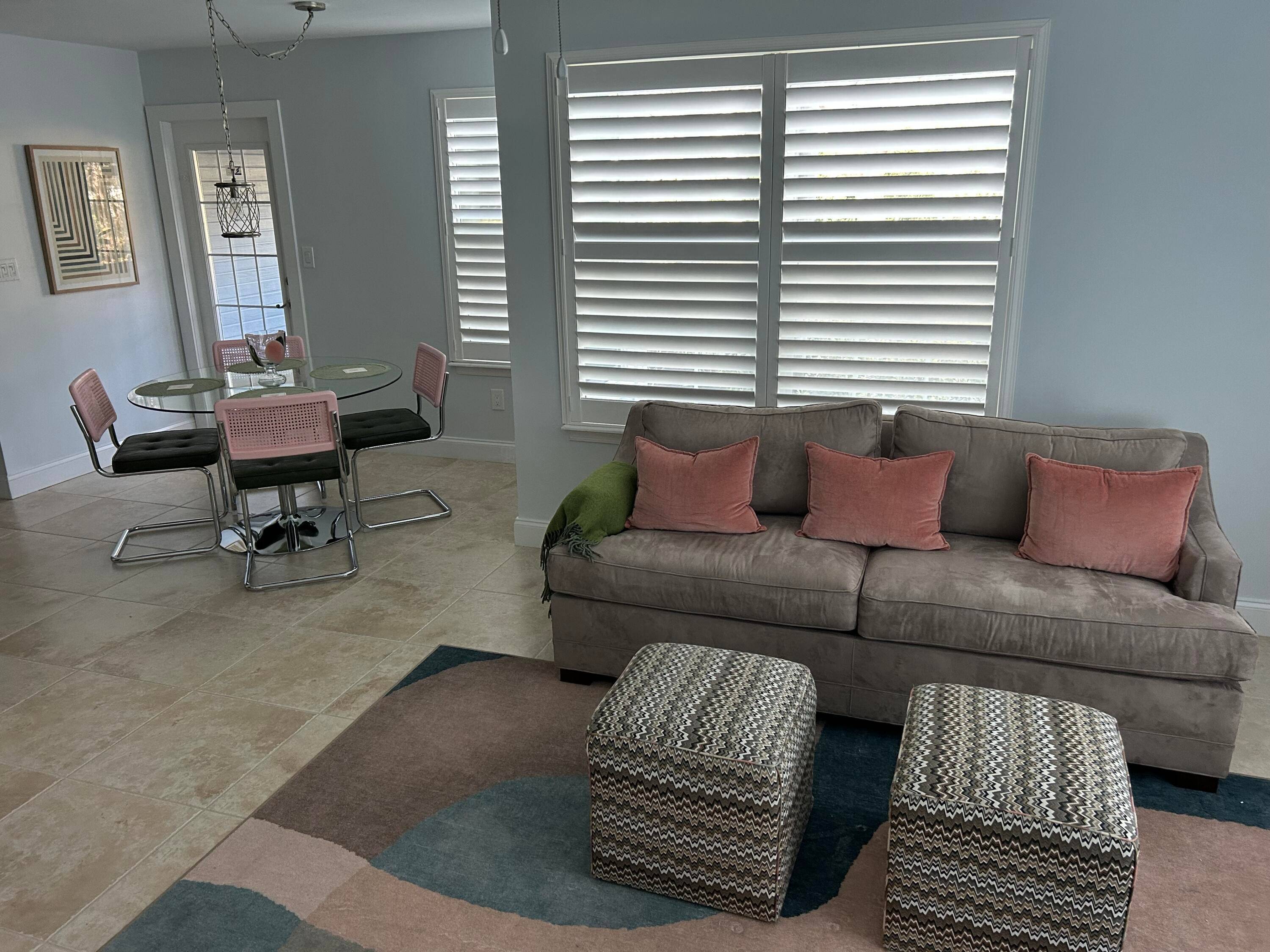 SEASONAL RENTAL Live a Key West like resort lifestyle in this first floor lakefront furnished 2 BR 2BA condo 1 MILE FROM THE BEACH AND 2 TO DOWNTOWN DELRAY Serene ...