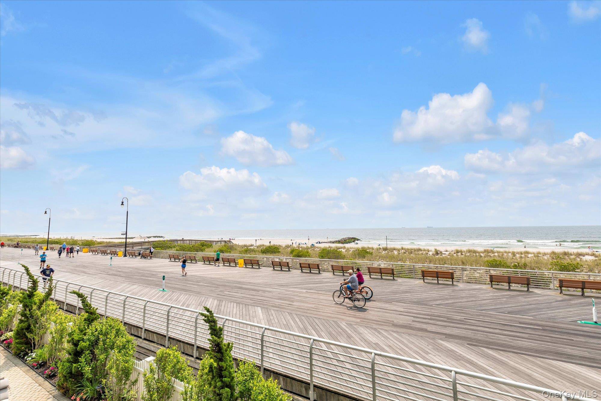 Discover this stunning oceanfront townhouse nestled on the beautiful Long Beach boardwalk.