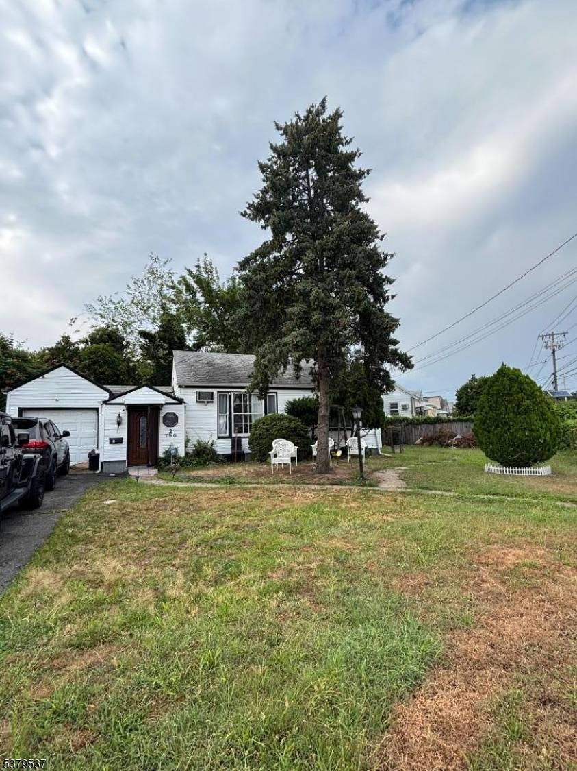 WELCOME to this charming Colonial situated on a spacious 73 x 90 lot offering plenty of potential in great location !