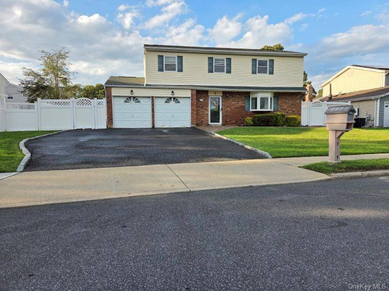 This beautiful Colonial Splanch home offers 4 spacious bedrooms and 2.