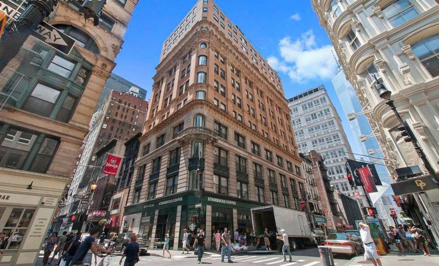 This extraordinary loft showcases stunning Beaux Arts architecture within a magnificent vintage limestone and brick building from the 1890s, designed by renowned architects DeLemos amp ; Cordes.