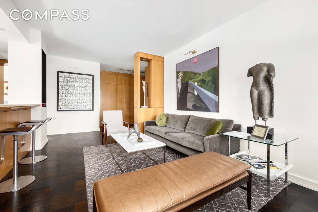 Perched 12 floors up on one of Chelsea s most coveted landmarked corners, this custom renovated two bedroom residence with the highest ceilings in the building captures some of downtown ...