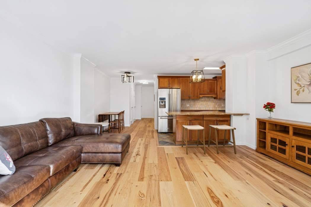 Refined Living, Ready Now Sun splashed high floor 2BR with balcony offering tremendous value truly cheaper than renting !