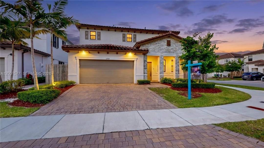 Stunning new construction two story corner lot home with 5 bedrooms and 3 bathrooms !