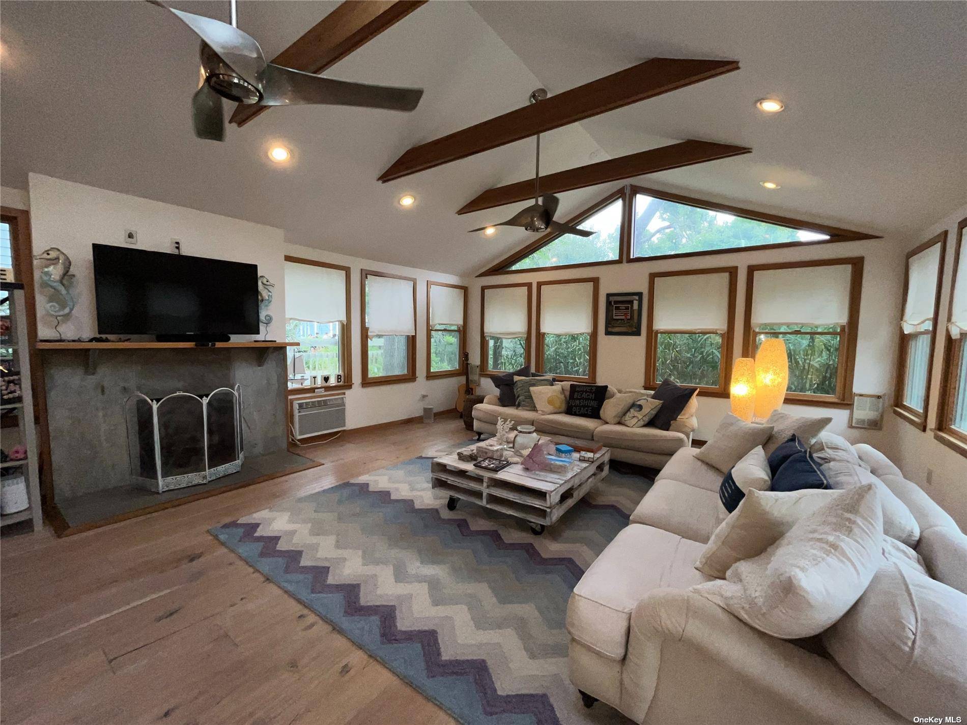 Offering four bedrooms and two full baths, this lovely two story beach home is the perfect retreat in a great location !