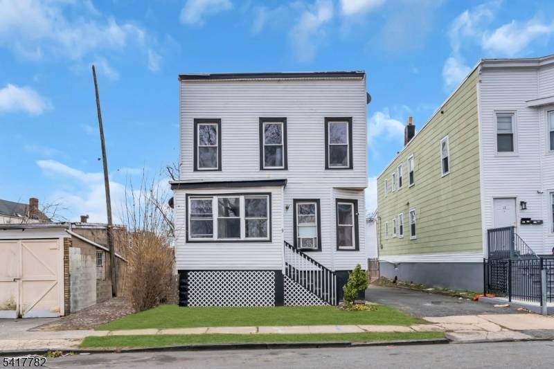 This beautifully redone two family home is move in ready and perfect for end users or investors !