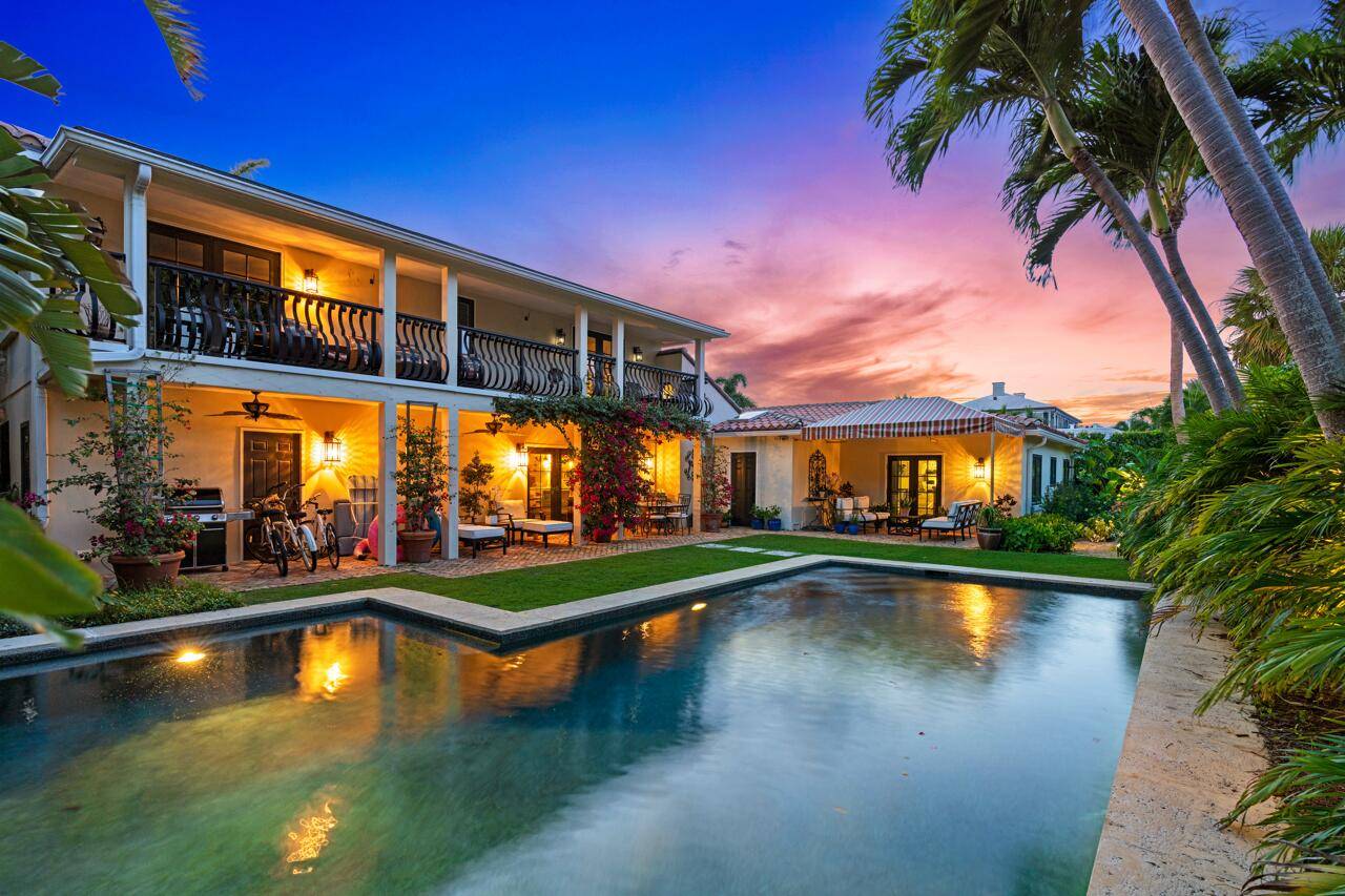 Beautiful designer decorated fully furnished 4 bed home with gorgeous pool, exquisite gardens fountain on oversized corner lot.