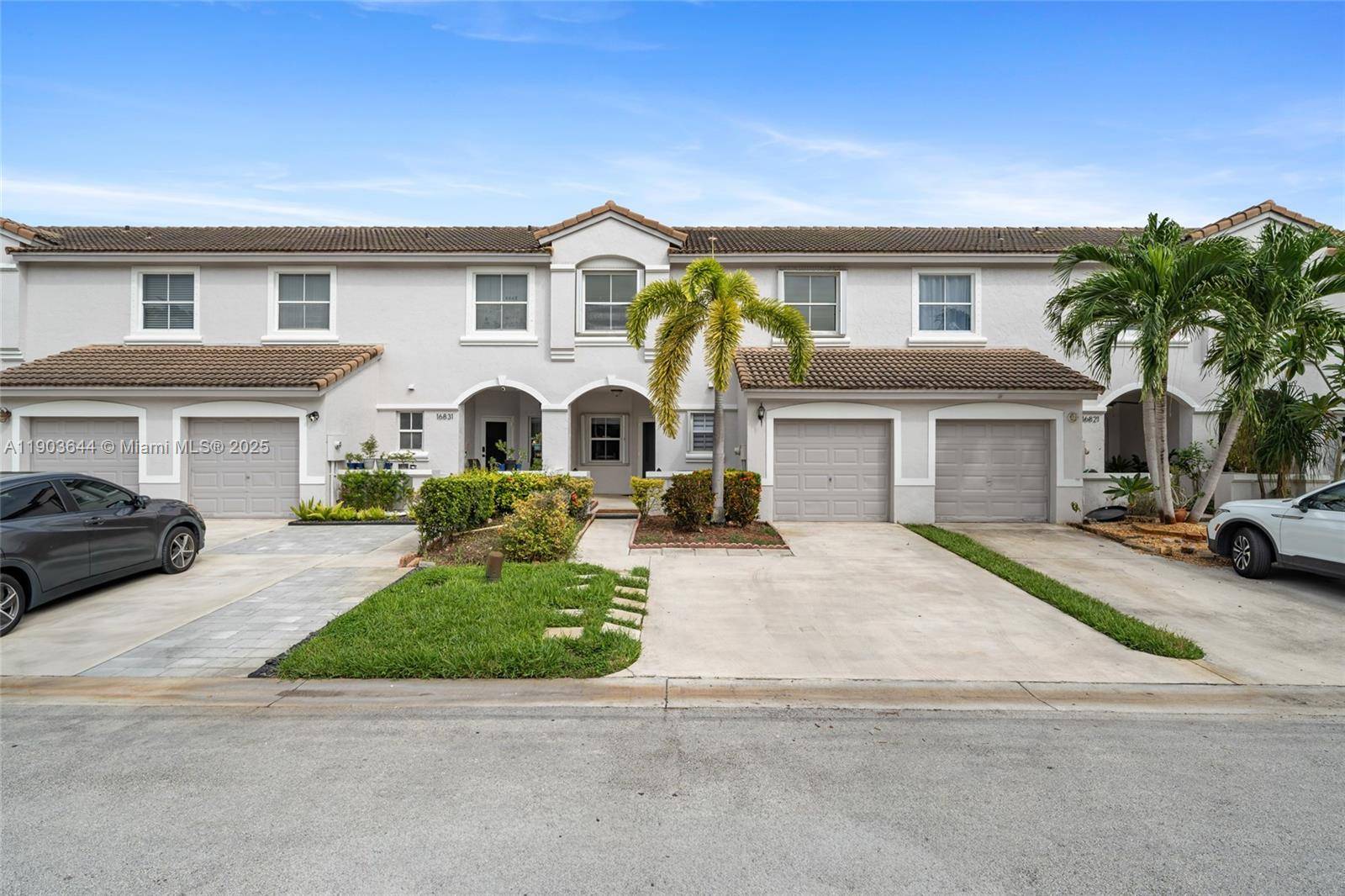 This is your ideal S. Florida townhome in the highly desirable, guard gated community of Sterling Place in Pembroke Shores !