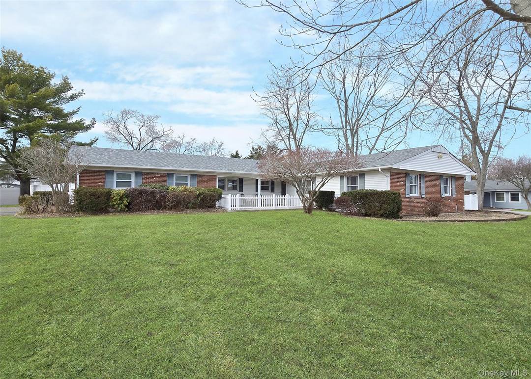 This Move in Ready 4 bedroom, 2 bath ranch is situated on over half an acre of land in the Three Village School District.