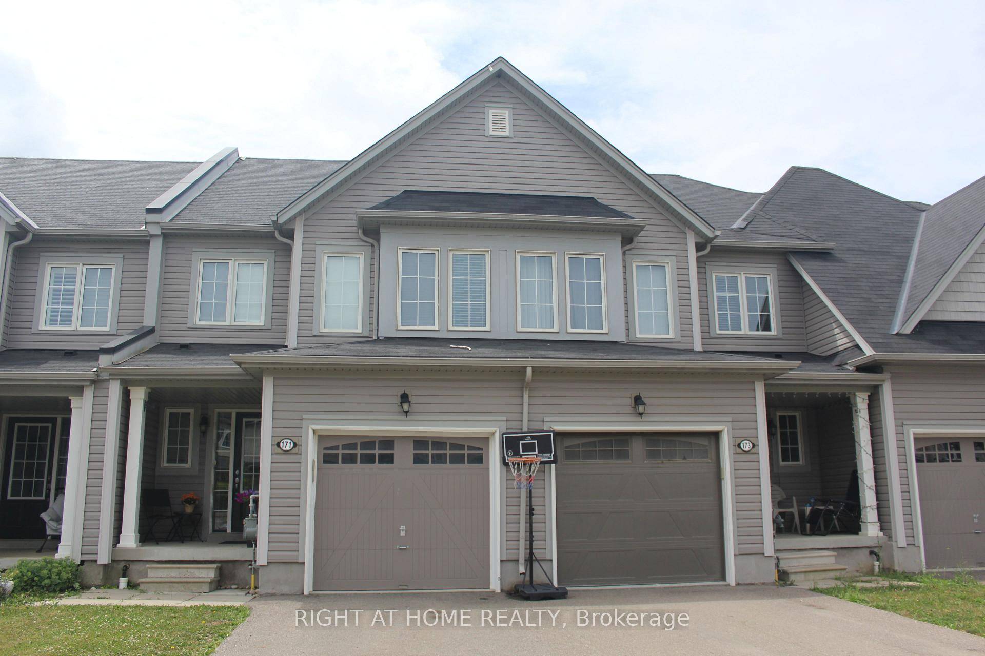 Welcome To This Beautiful Freehold 2 Storey Townhouse In The Highly Desirable Binbrook Fairgrounds Community.