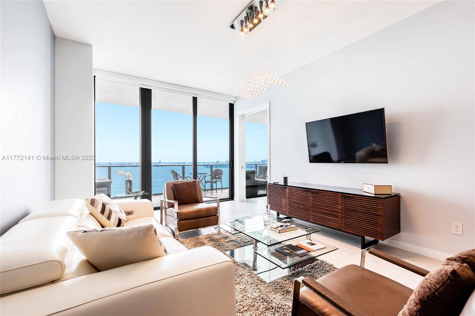 Impressive unit with 2 bedrooms Den amp ; 3 full bathrooms at Gran Paraiso offering endless views to the bay and the ocean.