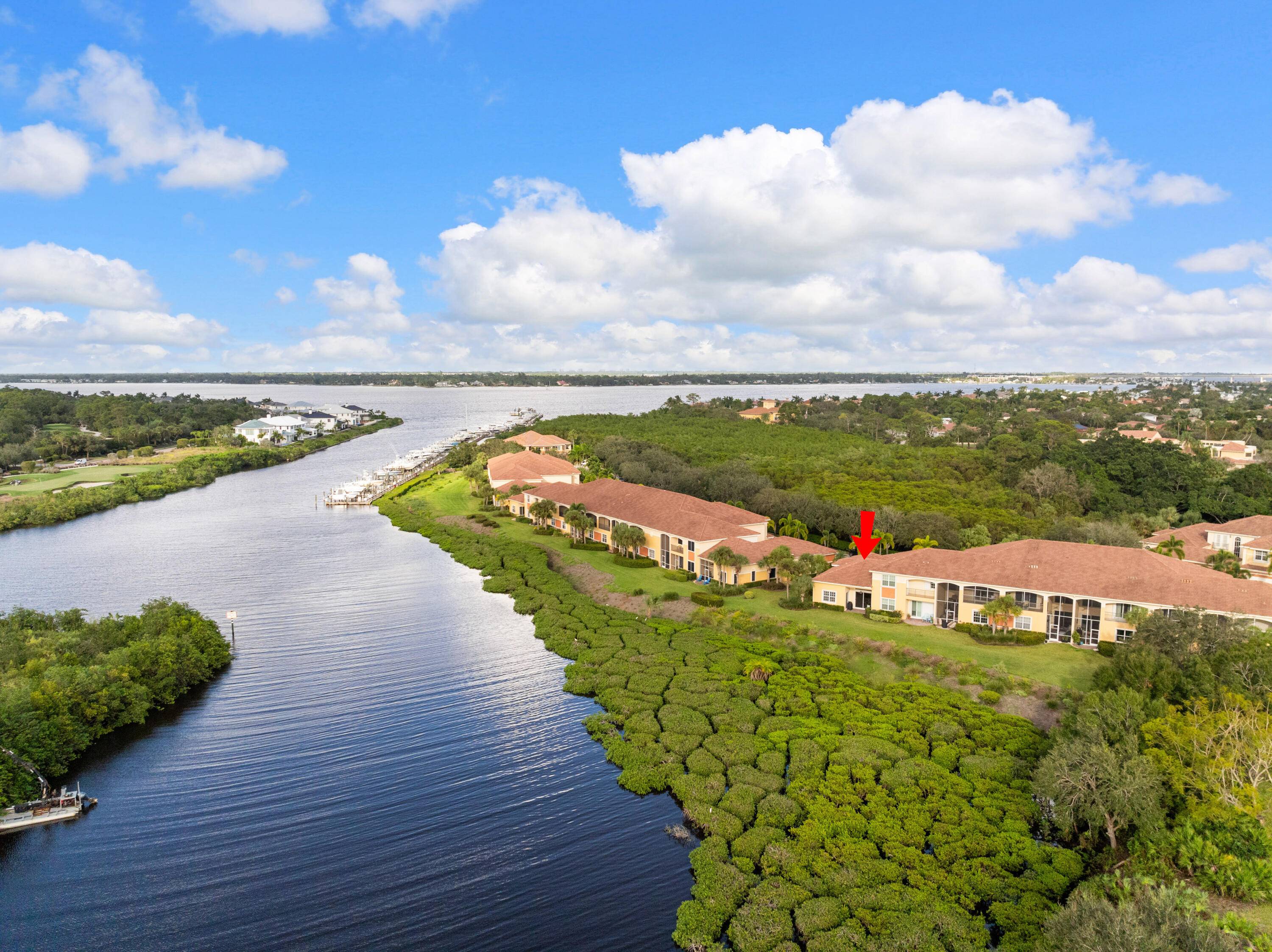 Luxurious Waterfront End Unit Townhouse in ''Harbour Island'' at Palm Cove Golf Yacht Club.