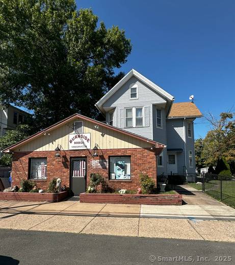 Great Street Presence, Convenient Location Turn this into your Store Front and workshop 2 family house in front with store front separate single family and 5 bay garage and a ...