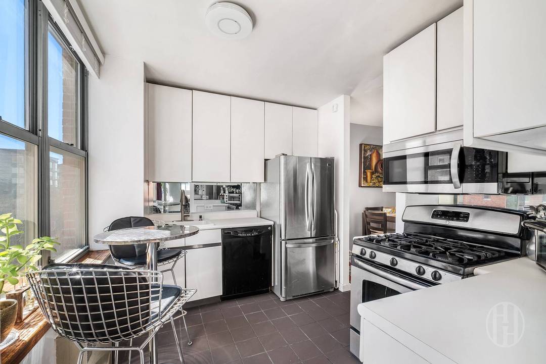 This beautifully proportioned two bedroom, one and a half bath home offers generous living space, abundant natural light, and exceptional versatility.