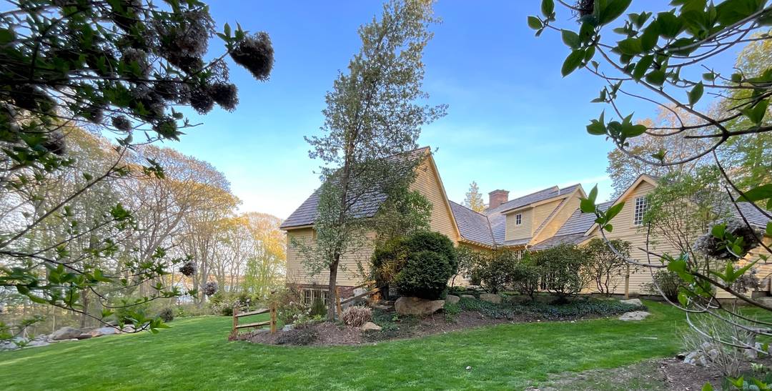 Set along a coveted stretch of the New England coastline with views of the Mystic River Long Island Sound, this coastal Noank, CT estate is a masterclass in cape style ...