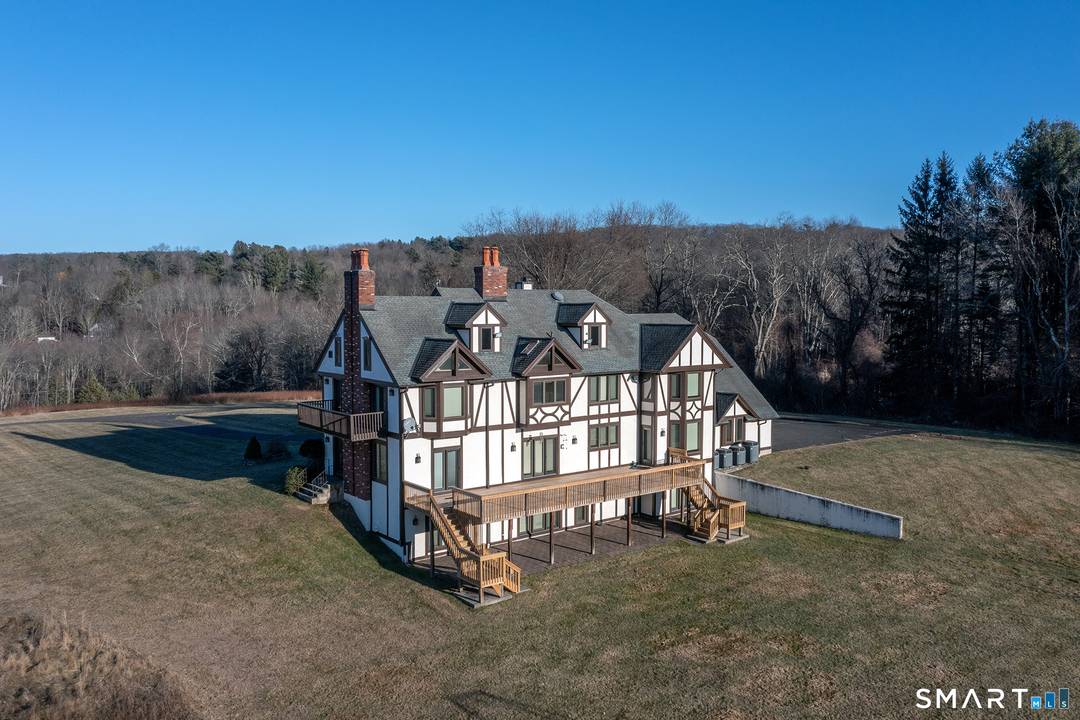Perched above the tranquil waters of Jacks Brook in southern Roxbury, this Modern Mountain Tudor offers refined open concept living with exceptional accessibility to New York City, just five minutes ...
