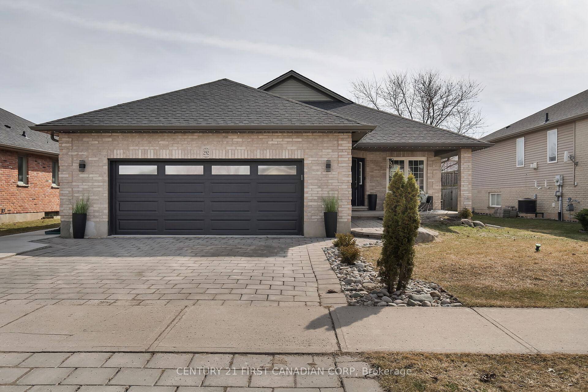 This beautifully updated bungalow in Strathroy's desirable neighbourhood offers an exceptional living experience.