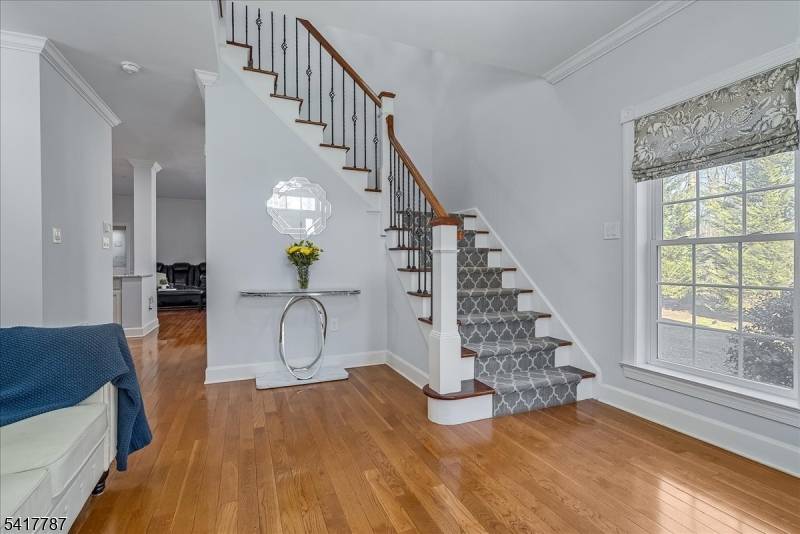 Experience elevated luxury townhouse living in this stunning end unit residence in the heart of Morristown.