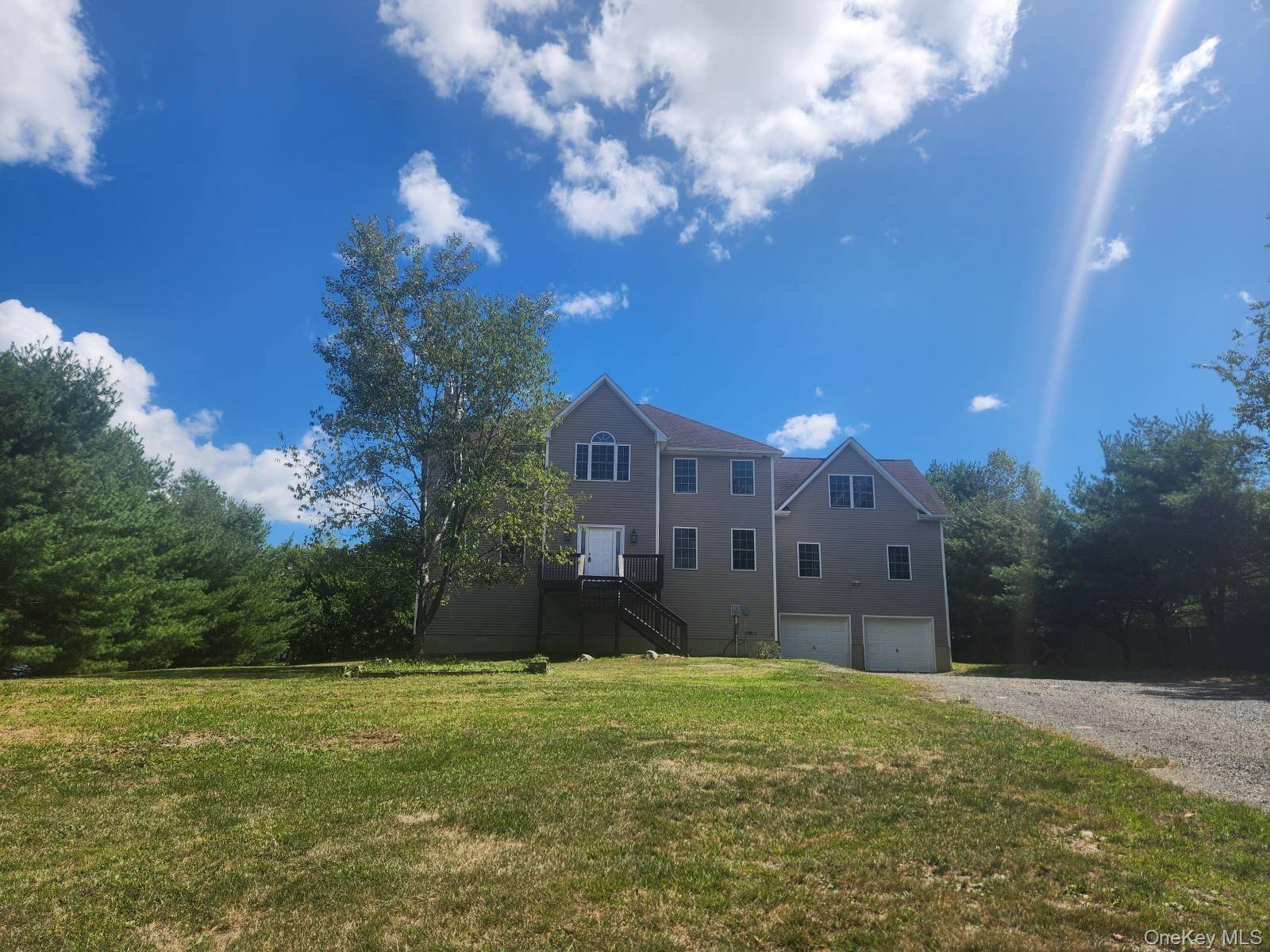 Beautiful private colonial with a huge front and backyard with beautiful views.