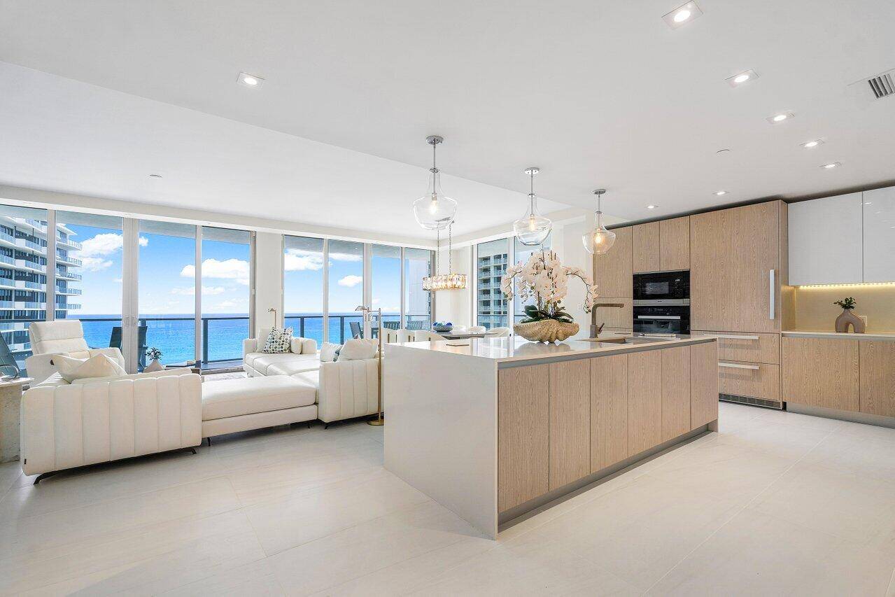 Experience paradise in this stunning designer furnished 2 bedroom, 2 bath oceanfront condo on Singer Island, FL.