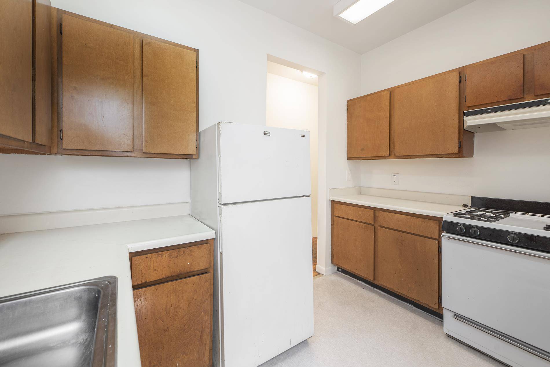 This rarely available rear warm and quiet two bedroom, one bathroom home with the same owner for over 30 years is ready for your taste updates.