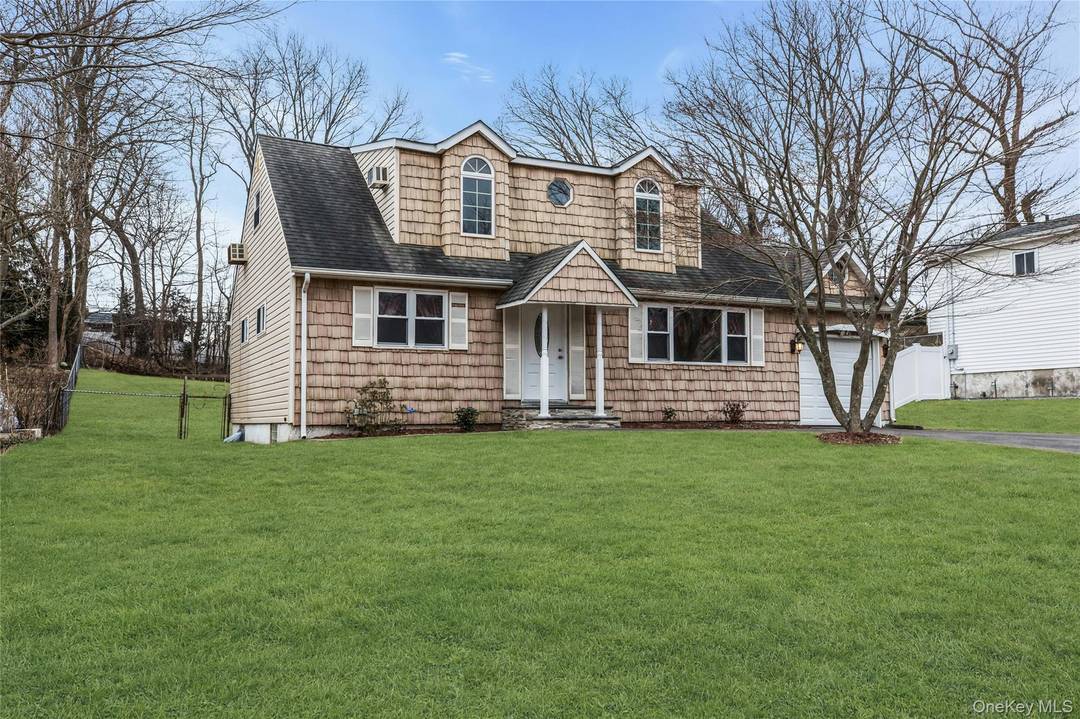 Welcome to this well maintained four bedroom, two bath double dormered expanded Cape, ideally located in the highly desirable Bird Section of Hauppauge.