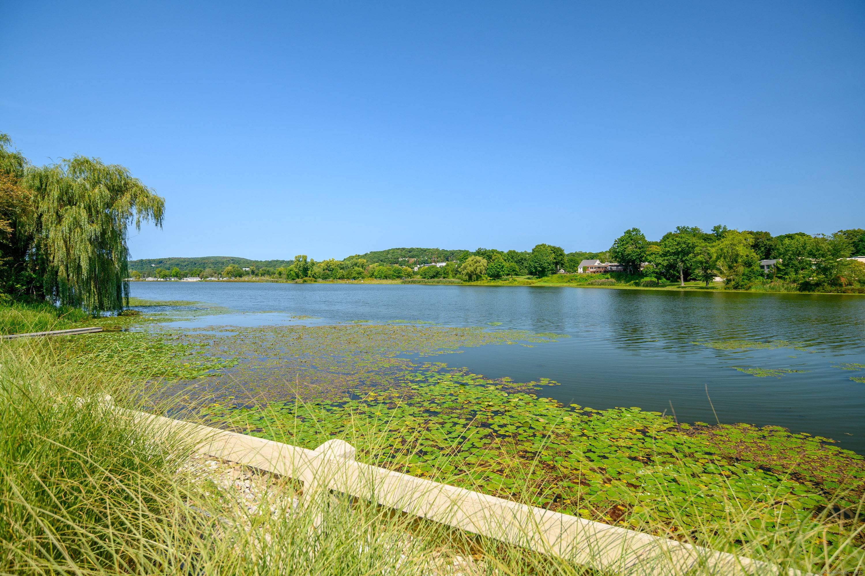 Year round waterfront lake views near the NY border offering carefree living.