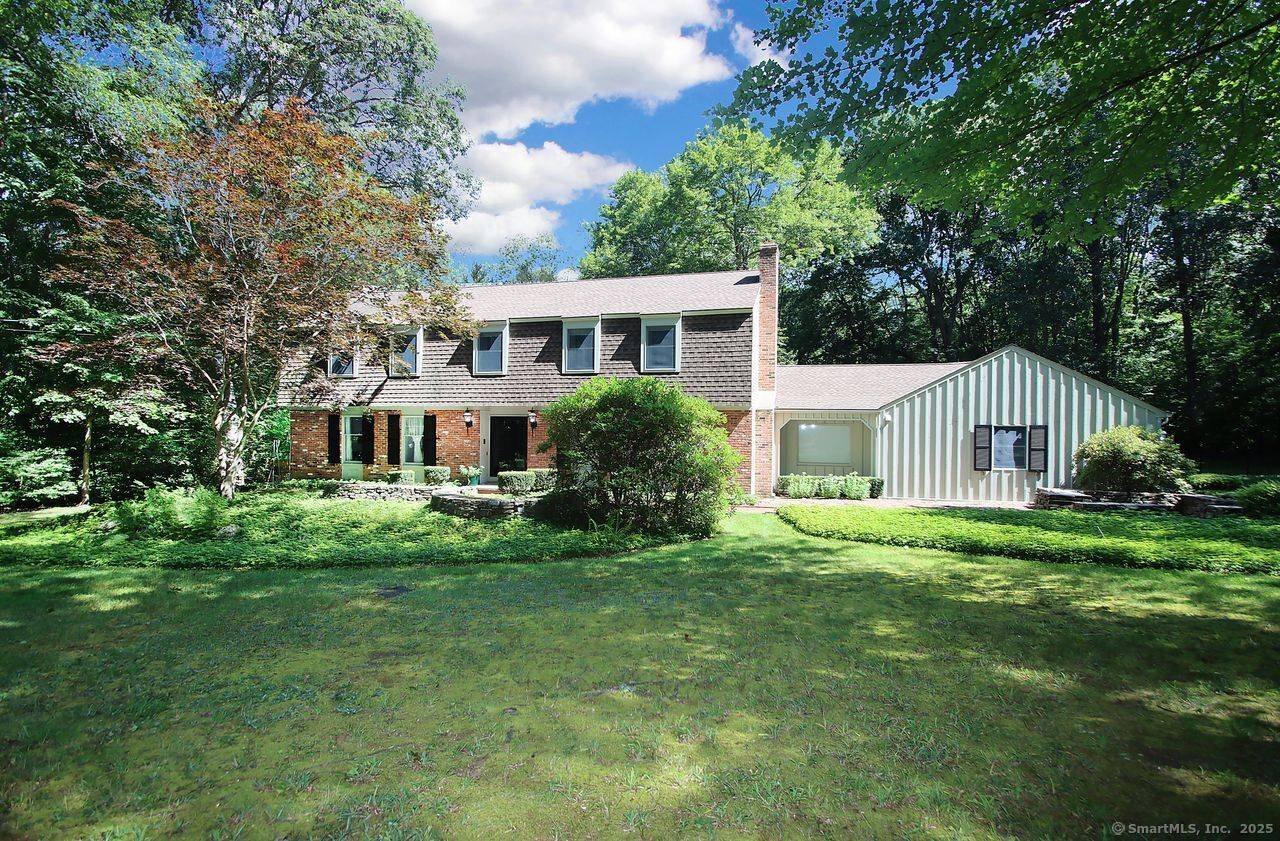 Nestled just minutes from the heart of downtown Madison, this exceptional property offers the perfect blend of convenience, privacy, and year round beauty.