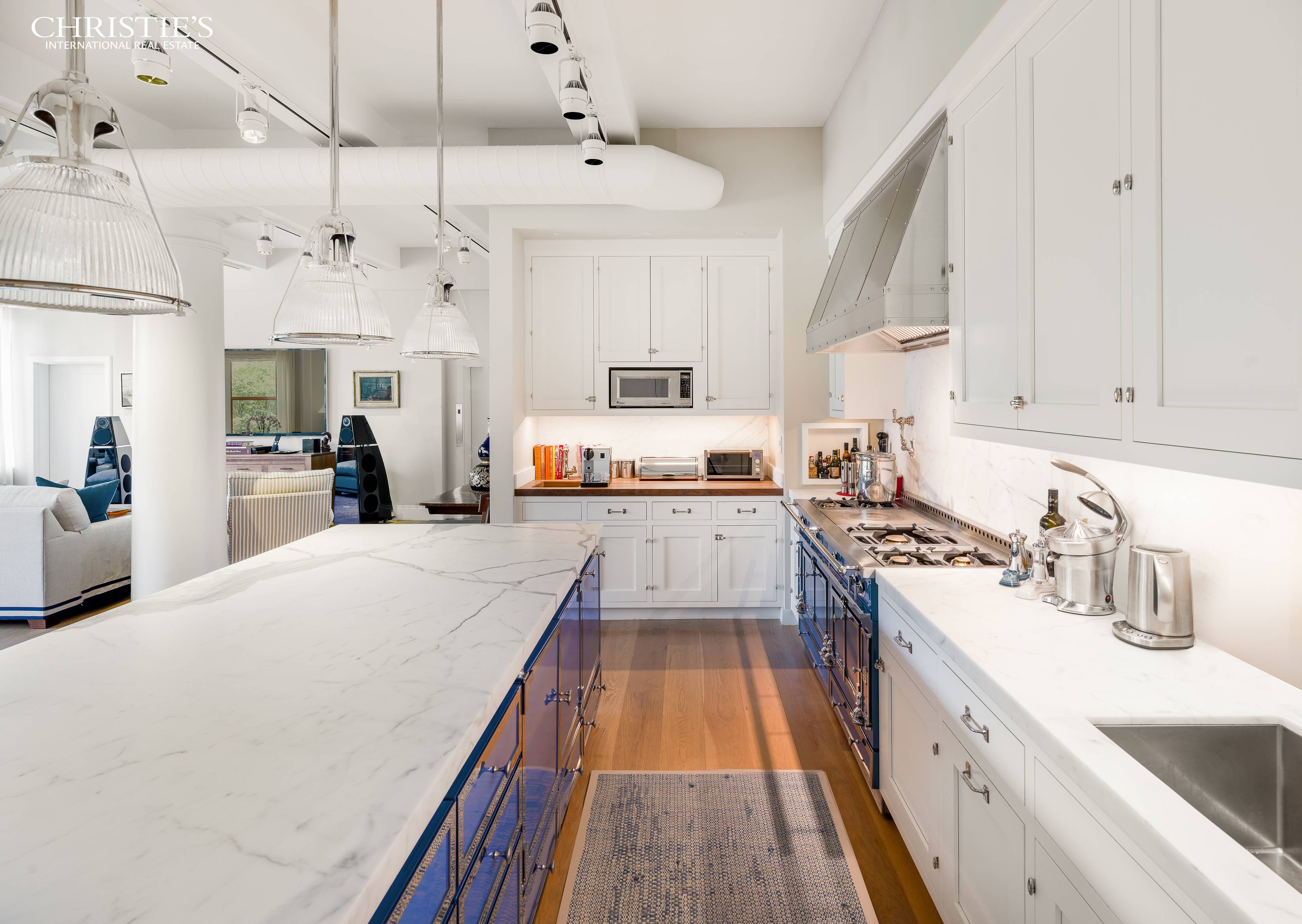 PALATIAL AND POLISHED FULL FLOOR LOFT Prepare yourself for perfection with this impeccable, and architecturally renovated, SoHo Greenwich Village loft featuring 5 bedrooms, and 4 full and 2 half baths.