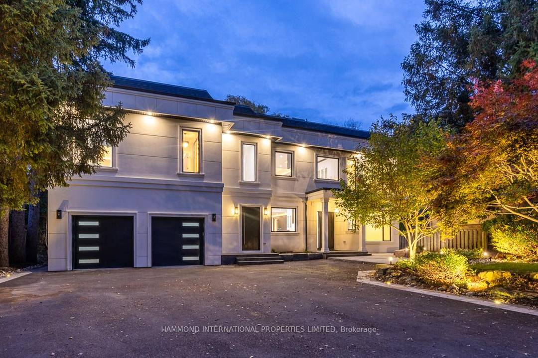 Introducing Markham's premier gated dual residence estate, offering over 7000 SF 5, 500 SF Above Grade of luxurious living space on a breathtaking 80 by 200 foot ravine lot.
