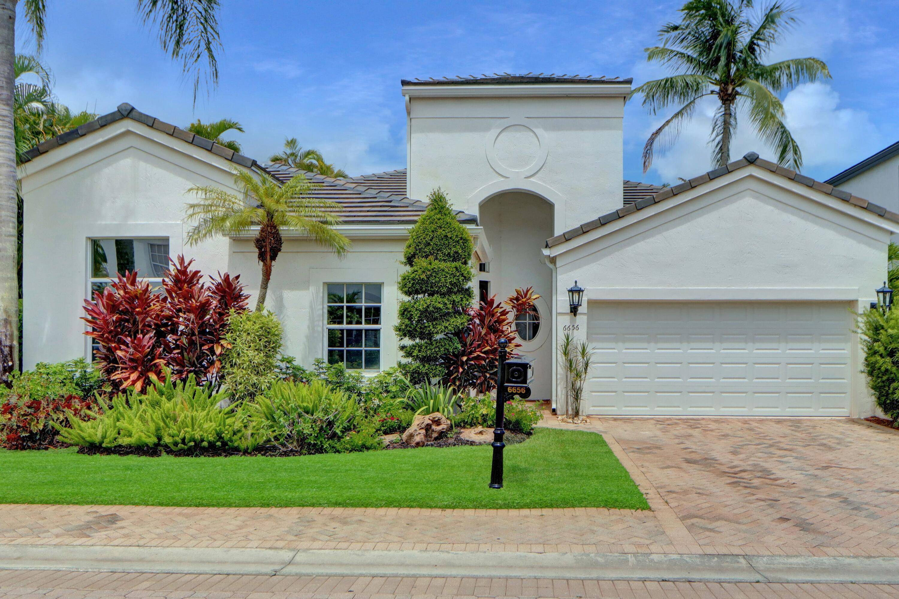 Nestled on a private corner lot with extensive tropical landscaping, this light, bright and open 3 bedroom 2 bath one story home features volume ceilings ; neutral luxury vinyl flooring ...