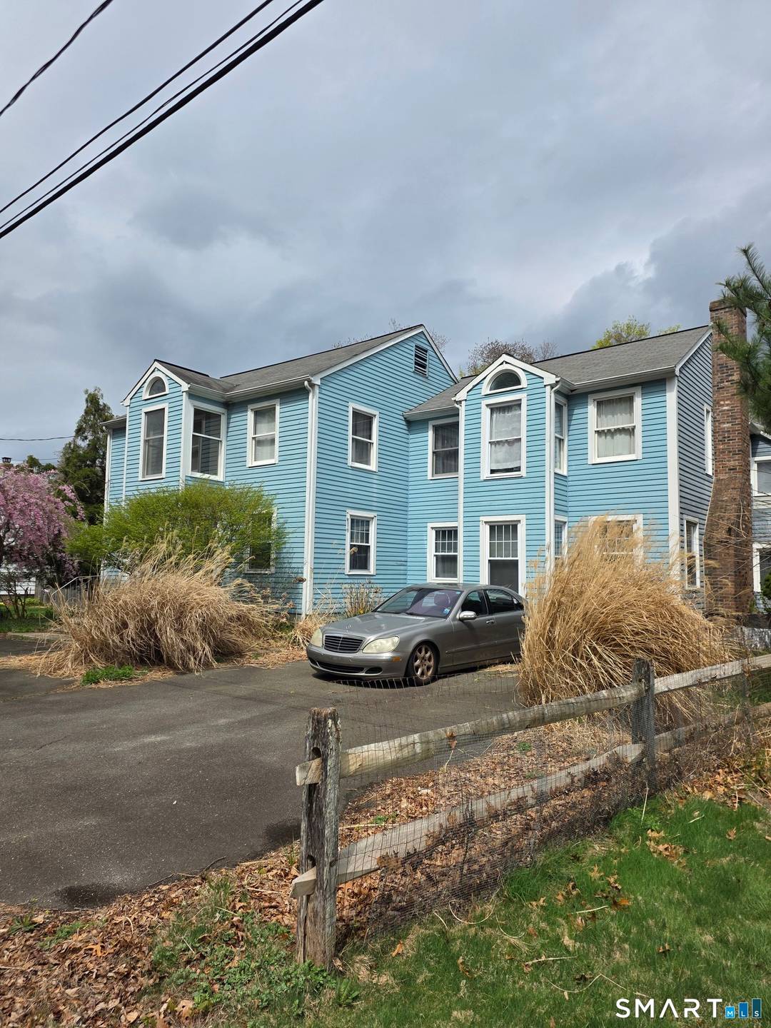 Spacious village area colonial with lot's of space and in what a location, a short stroll to Main Street and convenient to shops, highways and the railroad station.