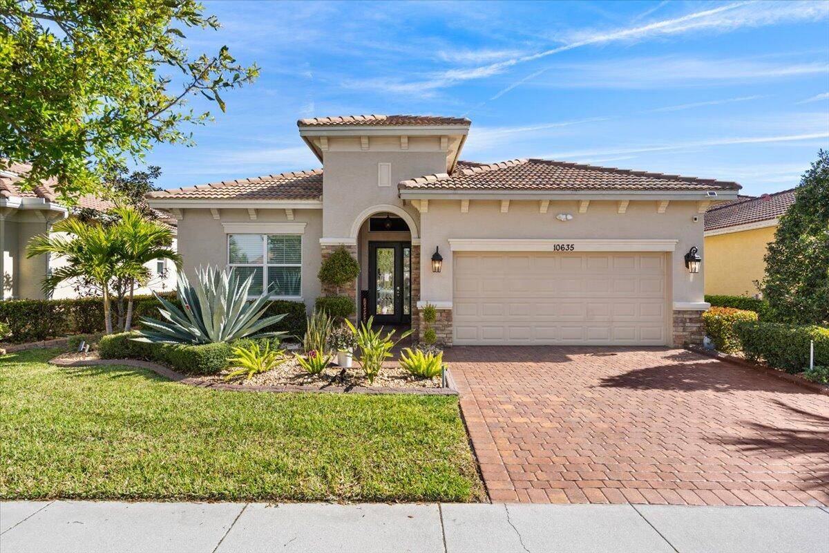 Fabulous ''LAGO'' Model, this pool home sits in the Isle of Capraia, surrounded by water and no thru traffic in Verano PGA Village.
