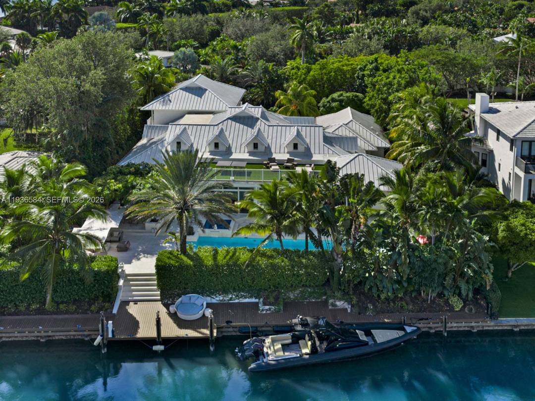 Step Inside With Me ! This Coastal Contemporary waterfront retreat in the private Bay Point community greets with 21' ceilings and abundant natural light.