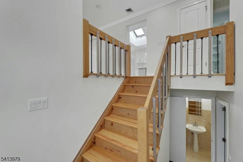 A wonderful opportunity awaits in this beautifully renovated bi level home set on a park like property in a desirable section of Wayne.