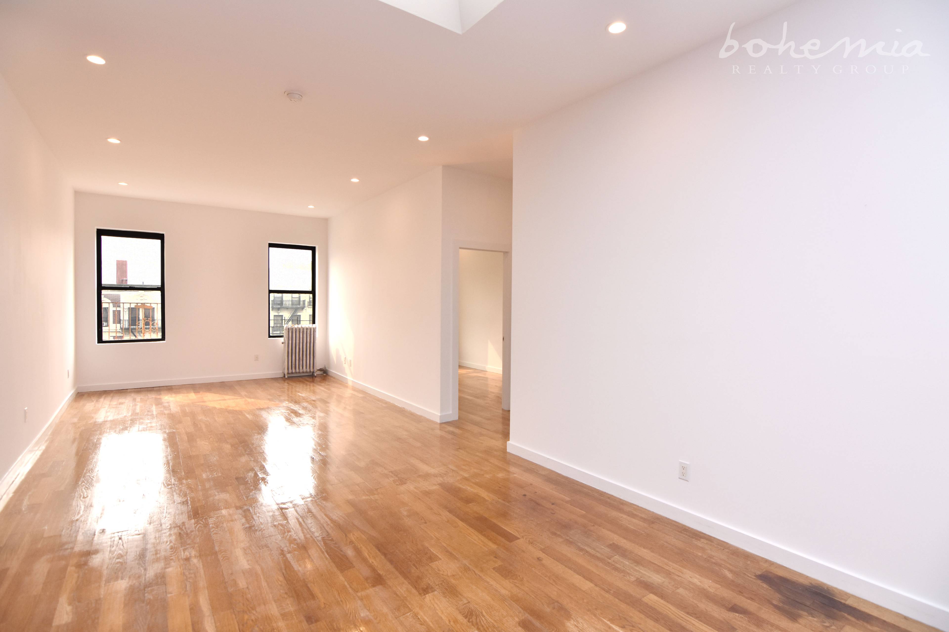 Renovated amp ; Spacious Hamilton Heights 4BR 2BA Featuring Hardwood Floors, SS Appliances, Dishwasher, and Exposed Brick.