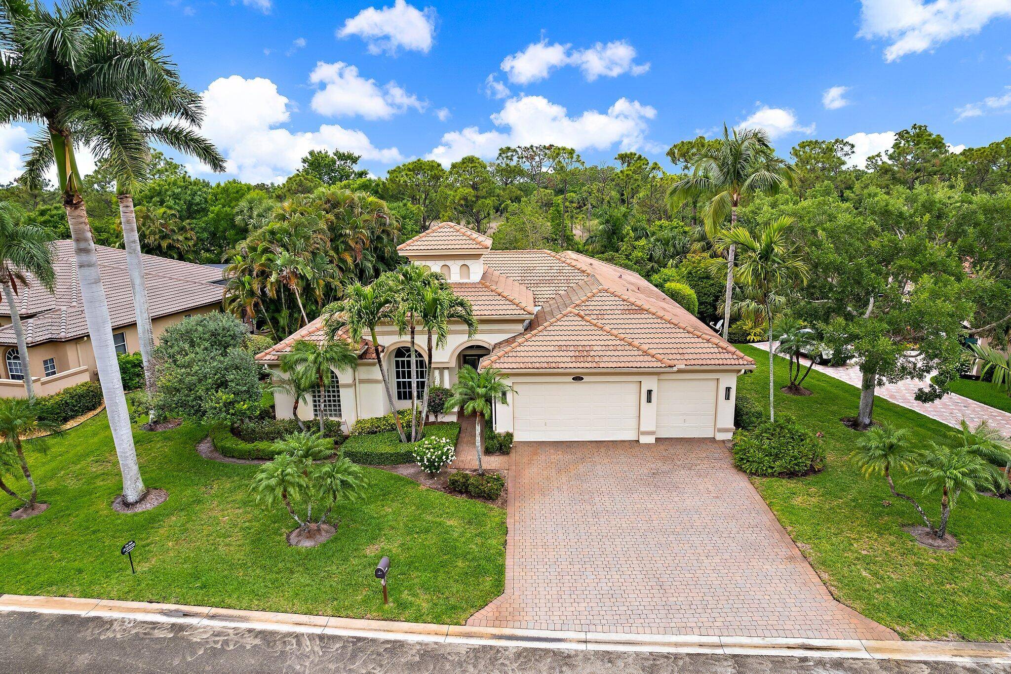 Enjoy Florida living in this outstanding Arthur Rutenberg 4 bedroom home, plus den, located in the gated community of The Falls of Lost Lake.