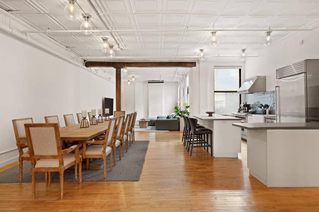 Residence 5B at 5 White Street is a 2, 500 square foot, three bedroom, two bath loft that blends authentic downtown character with modern comfort.