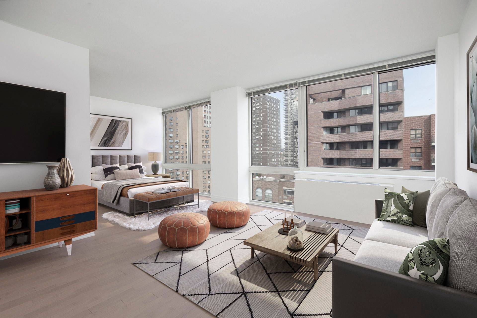 Oversized studio alcove with dedicated sleeping alcove, room for a dining area or home office, formal entry foyer, and in unit washer dryer.